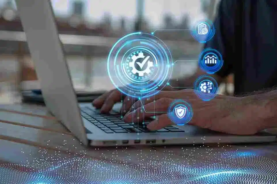 A imagem ilustra o conceito de PDV (Point of Sale) digital, mostrando um laptop com ícones de tecnologia e comércio em volta, como proteção, gráficos e processamento. No contexto do artigo sobre o PDV da ONCLICK, isso reflete a integração de sistemas de PDV com soluções tecnológicas avançadas para melhorar a gestão de vendas, financeiras e operacionais em um ambiente varejista.
