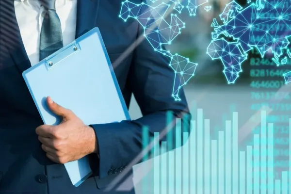 A imagem mostra um homem de negócios de vestimenta formal, segurando um portfólio, com gráficos e representações de redes complexas e números flutuantes ao seu redor. Essas representações visuais sugerem a ideia de análise de dados, processamento de informações e networking, elementos-chave das tecnologias financeiras modernas. No contexto do artigo "Conheça as tecnologias financeiras práticas e completas", a imagem pode ser usada para ilustrar como a tecnologia está se integrando ao mundo financeiro, proporcionando ferramentas para análise de mercado, tomada de decisões informadas e gerenciamento de riscos. As tecnologias financeiras abrangem uma ampla gama de soluções, desde o processamento de pagamentos até a automação de investimentos, passando por blockchain, inteligência artificial e análise preditiva. A imagem reflete a sofisticação e a complexidade dessas ferramentas e a importância de uma compreensão prática delas para os profissionais de finanças e negócios.